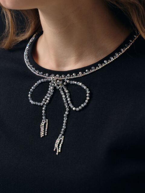 Футболка с бантиком черная